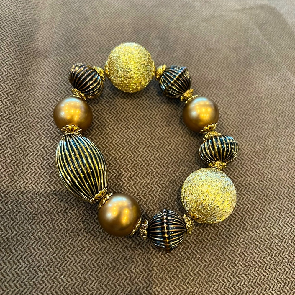 Gold and bronze statement bracelet